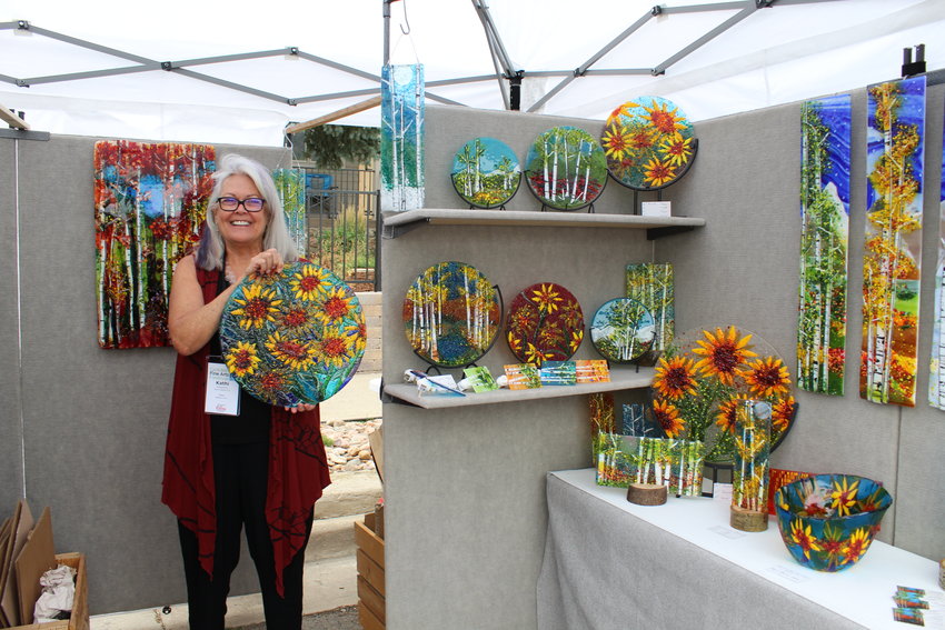 Fort Collins' Kathi Dougherty displays her glass-based artwork at the Golden Fine Arts Festival Aug. 20 in downtown Golden.